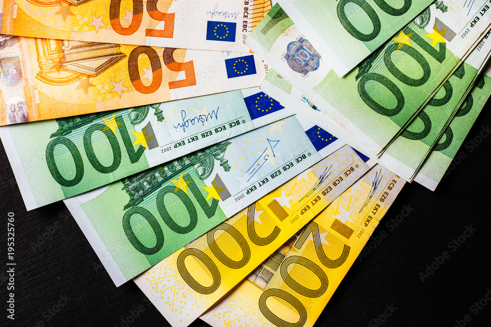 Euro banknotes close up. Several hundred euro banknotes Euro banknotes close up. Several hundred euro banknotes