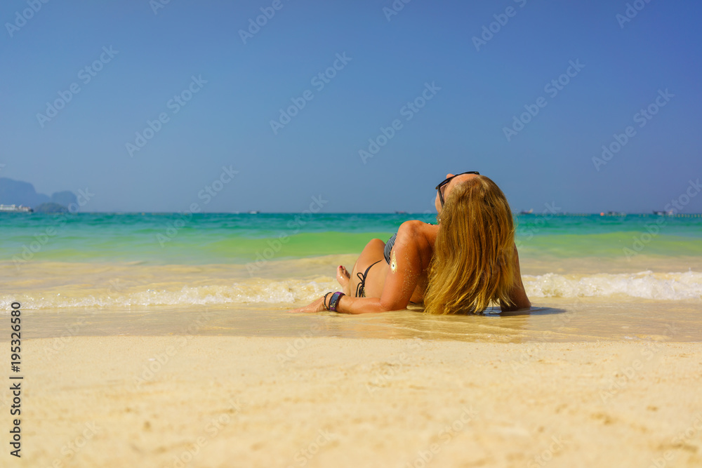 woman resting at the tropical Thailand Railay beach woman resting at the tropical Thailand Railay beach