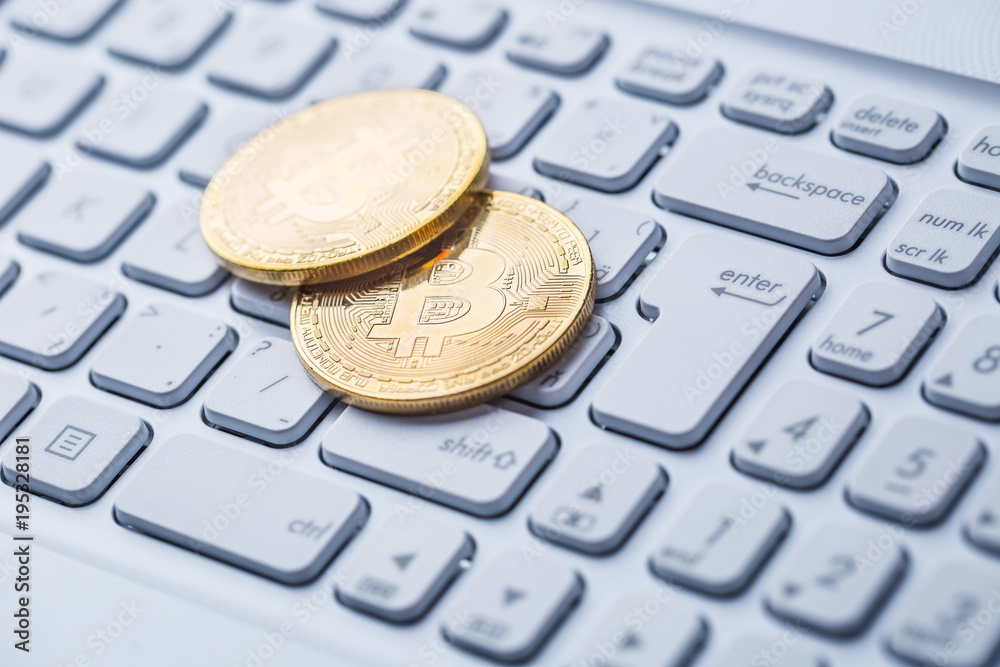 Bitcoins. Bitcoin symbol on laptop, currency, crypto currency sign Bitcoins. Bitcoin symbol on laptop, currency, crypto currency sign