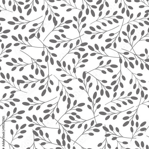 Vector seamless pattern. Floral stylish background. Silhouette of branches with leaves