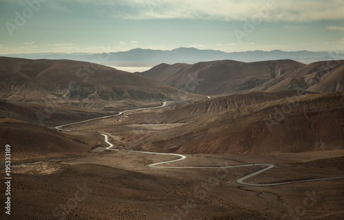 A sinuous road wriggling through a nice mountain scenery in Argentina