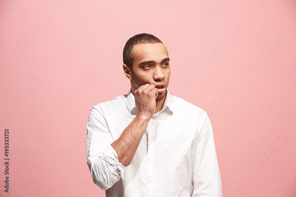 Beautiful bored man bored isolated on pink background Beautiful bored man bored isolated on pink background