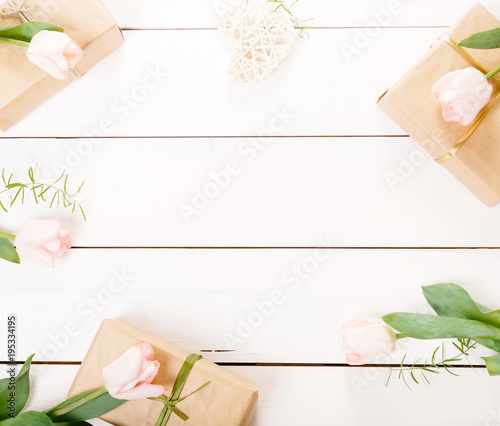 Flowers composition. Frame made of pink flowers on white background. Valentine's Day. Flat lay, top view. photo