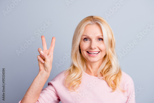 Skin leisure skincare people person concept. Close up portrait of pretty beautiful groomed gorgeous cute stunning granny making demonstrating v-sign with hand isolated on gray background copy-space