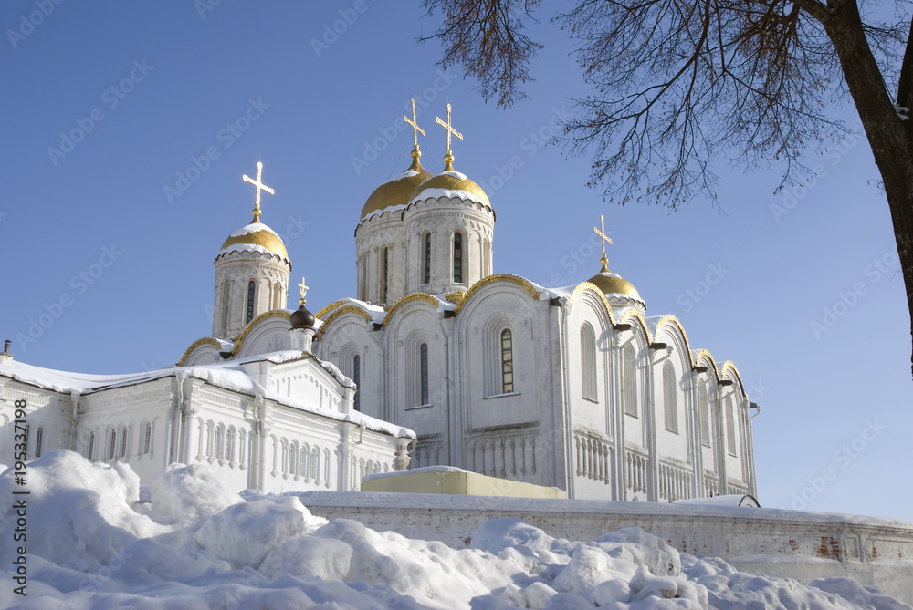 Assumption church in Vladimir town, Russia, famous by its frescoes painted by Andrey Rublev. Popular landmark. Color photo. Assumption church in Vladimir town, Russia, famous by its frescoes painted by Andrey Rublev. Popular landmark. Color photo.