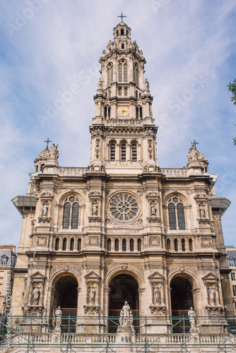 Clock tower of Sainte trinite, roman catholic church in Paris, France