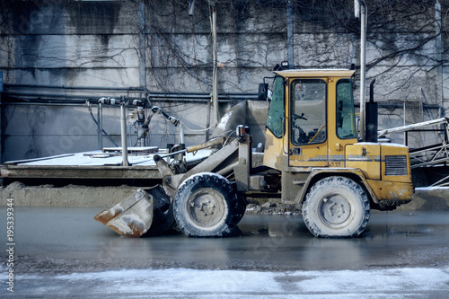 a bulldozer in freezing cold