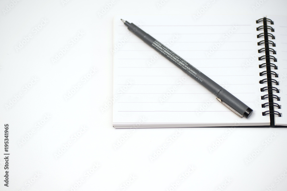 notebook and pen on White background notebook and pen on White background