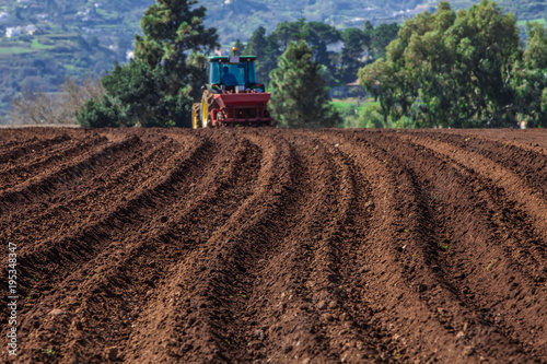 Tractor on potato field