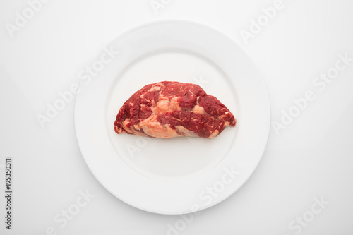 fresh beef meat on white plate