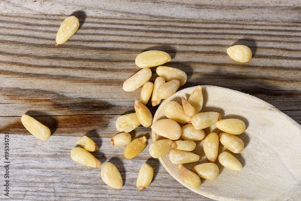 Group of pine nuts in cooking environment Group of pine nuts in cooking environment