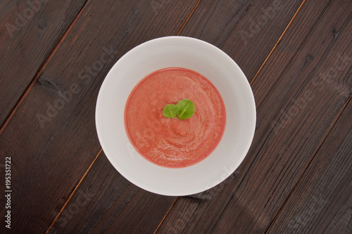 Beetroot soup with chickpeas on a table
