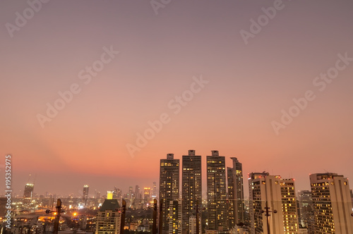 Wallpaper Mural Twilight time from skyscraper building view in middle downtown, vanilla sky with modern and high building. Torontodigital.ca