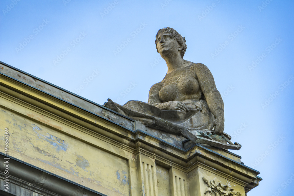 Obraz premium Sculptures on the roof of Arena del Sole Theatre in Bologna