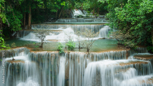 Fototapeta Naklejka Na Ścianę i Meble -  Breathtaking green waterfall, Erawan's waterfall, Located Kanchanaburi Province, Thailand
