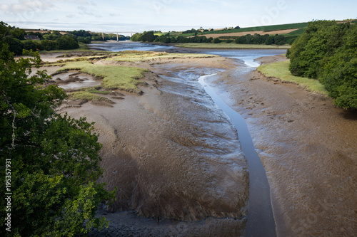View of river near seashore during the outflow reveals the mud and morass in Brittany - France