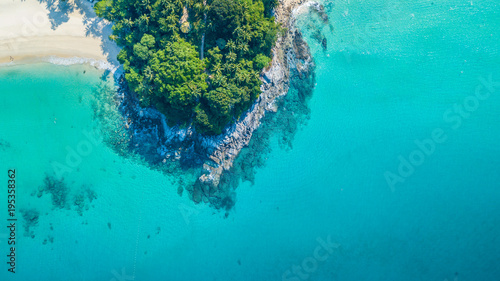 Obraz na płótnie Aerial view tropical island with white sand beach and blue clear water and grani