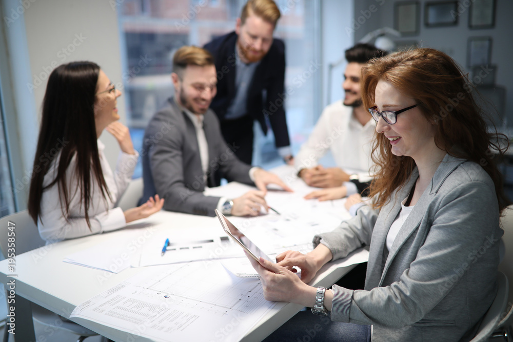 Group of architects working together on project