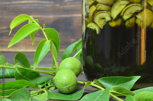 Preparing green walnut liqueur