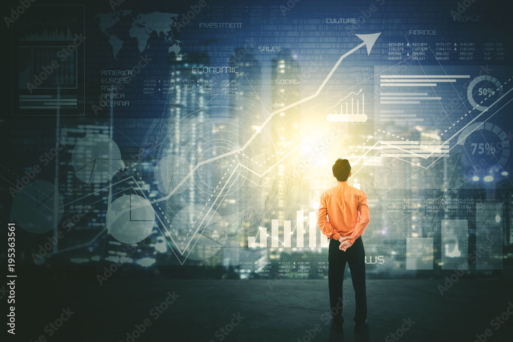 Back view of businessman using a futuristic HUD interface screen Back view of businessman using a futuristic HUD interface screen