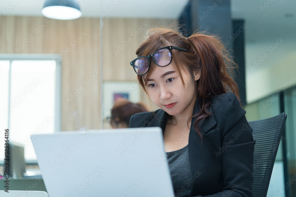 Business woman working in the office,Happy worker concept,Thailand people