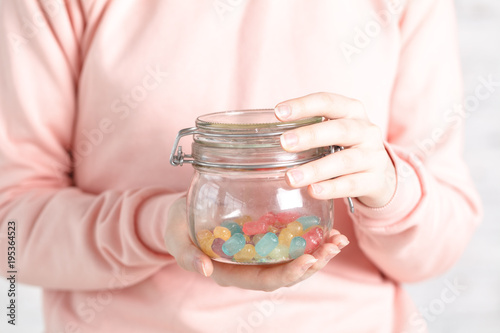 Female holg glass jar with jelly