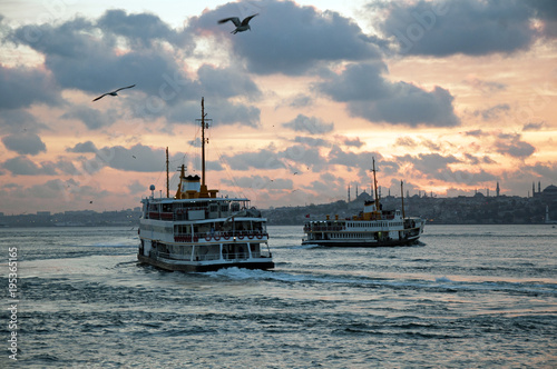 Steamboat aka ferry at bosphorus at sunset in istanbul photo