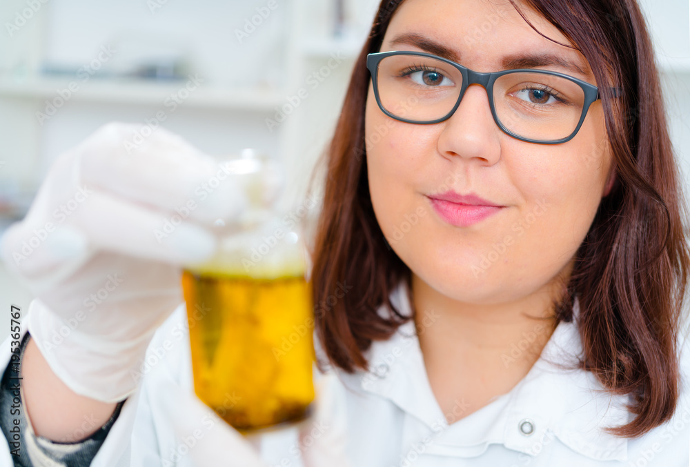 Girl teen in the laboratory of food quality tests Girl teen in the laboratory of food quality tests