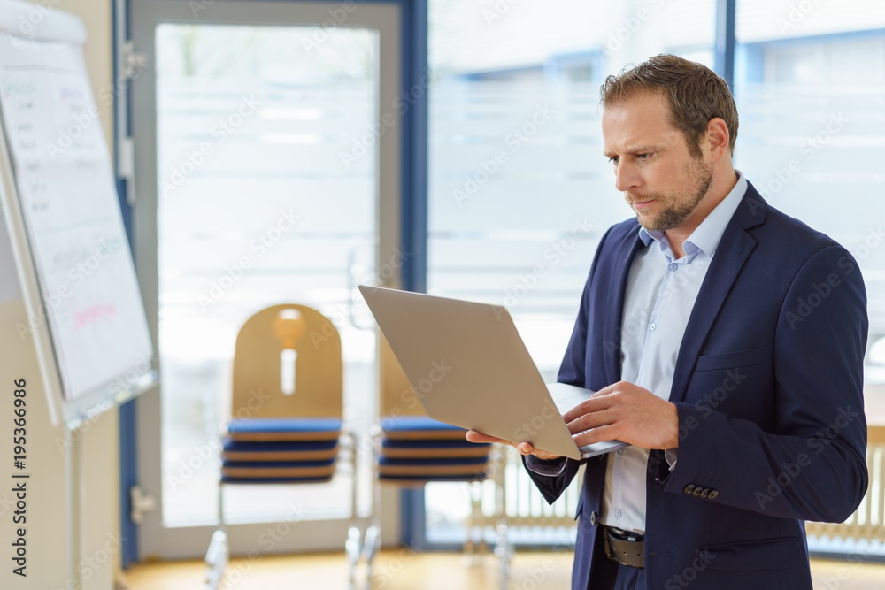 Businessman working on a presentation Businessman working on a presentation
