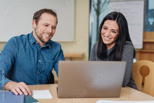 Happy smiling businessman and woman