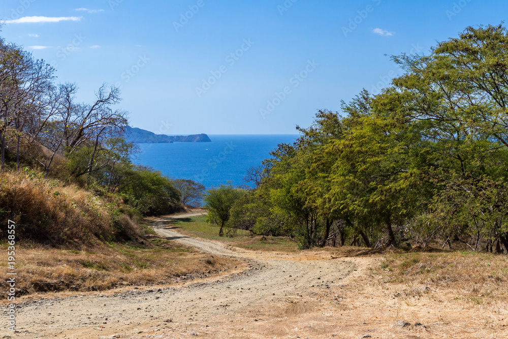 unpaved road to the beach