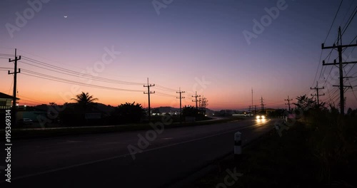 Time lapse of a beautiful twilight filmed from a roadside of a countryside, Chiang Rai province.