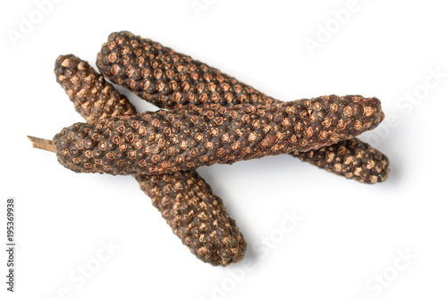 close up of dried long pepper isolated on white