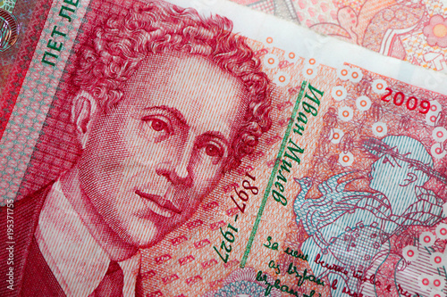 Photo depicts the Bulgarian currency banknote, 5 leva, BGN, close up. Depicts a portraiture of Ivan Milev, famous Bulgarian poet.