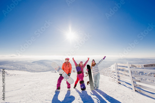 Fotografía Group of young women with snowboard winter sport