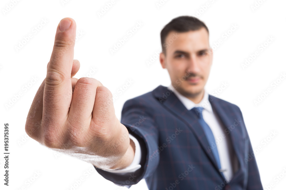 Focus on businessman hand showing middle finger. Focus on businessman hand showing middle finger.