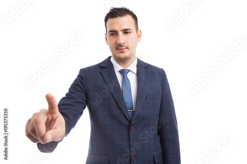 Financial broker or sales person touching invisible screen.