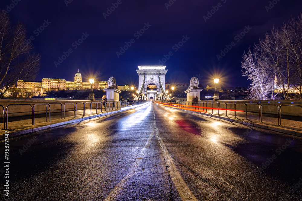Night view of illuminated Budapest with Danube river, palace and bridge, Hungary. Night view of illuminated Budapest with Danube river, palace and bridge, Hungary.