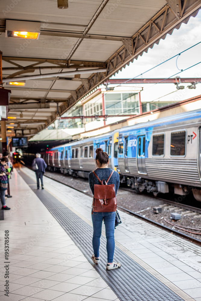 Fototapeta premium woman waiting for the train