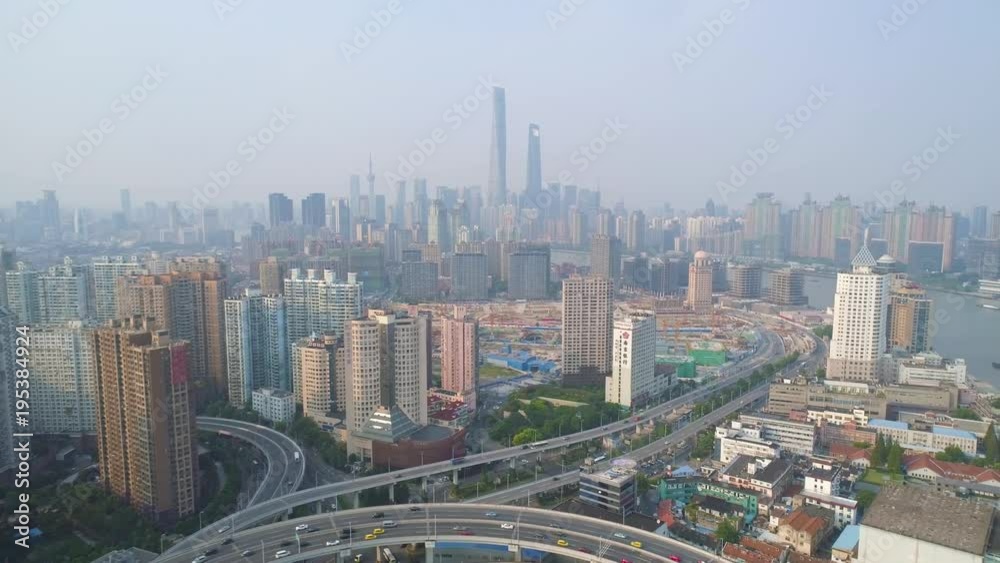 SHANGHAI, CHINA - MAY 5, 2017: Aerial view of Nanpu bridge highway junction, modern architecture SHANGHAI, CHINA - MAY 5, 2017: Aerial view of Nanpu bridge highway junction, modern architecture