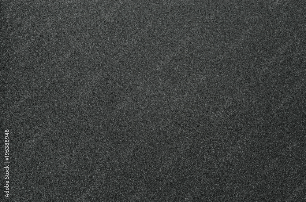 Grainy Texture of Black Plastic for Office Folders. Black Grainy Plastic Background Close-Up Grainy Texture of Black Plastic for Office Folders. Black Grainy Plastic Background Close-Up