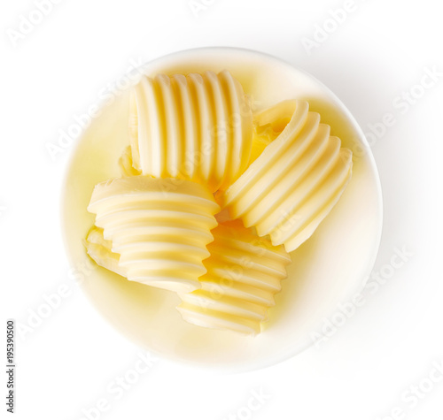 Butter curls isolated on white, from above