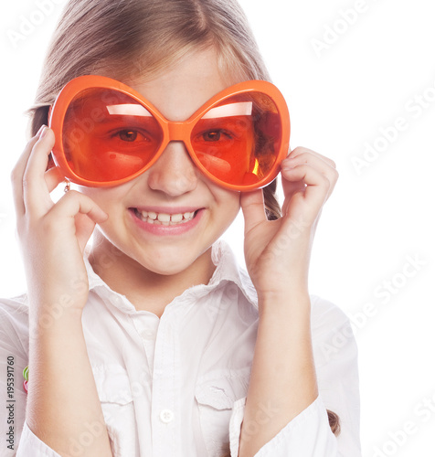 Cheerful Little Girl with Big Orange Glasses Isolated on the Whi