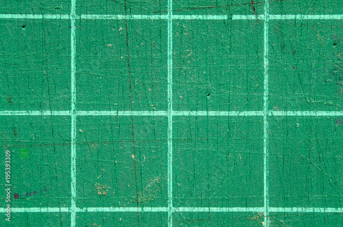 Texture of green scratched cutting mat.