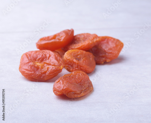 dried apricots isolated white background. selective focus. photo