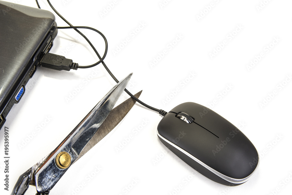 Computer mouse with black cable and scissors. Cut out or wireless connection Computer mouse with black cable and scissors. Cut out or wireless connection