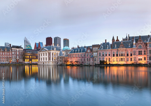 City Landscape, sunset panorama - view on pond Hofvijver and complex of buildings Binnenhof in from the city centre of The Hague, The Netherlands