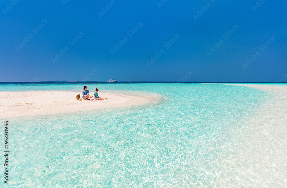 Mother and daughter at beach