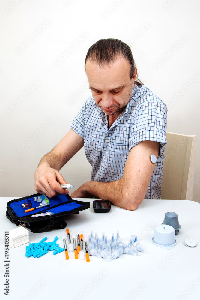 sensor diabetes checkup glucose man system sugar monitoring scan test hand skin medicine syringe table white background sensor diabetes checkup glucose man system sugar monitoring scan test hand skin medicine syringe table white background