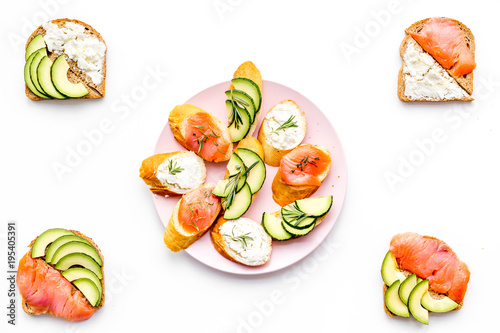 fitness breskfast with homemade sandwiches on white background top view